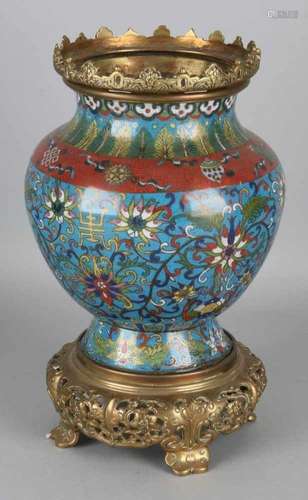 Antique 19th century Japanese cloisonne vase with bronze frames and floral decors. Size: 29 cm. In