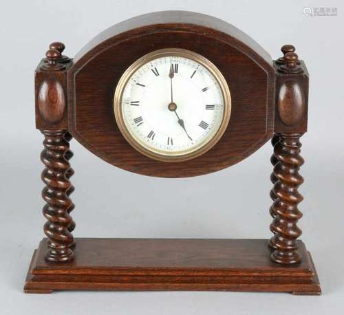 Antique English oak table clock with eight-day silent clockwork + overhead balance. Circa 1920.