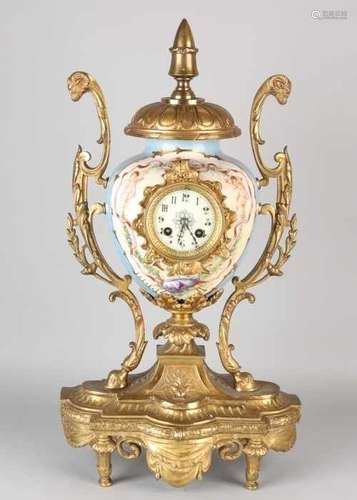 Large antique French vase with brass and porcelain. Circa 1870. Eight-day movement, half-hour stroke