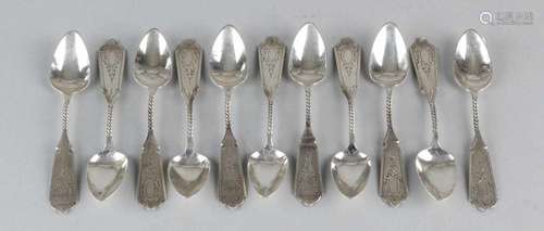 Eleven silver teaspoons, 835/000, with puntbak, a partially twisted handle and a stem with