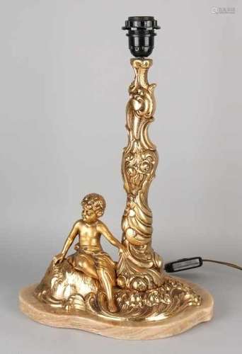 Gold plated large brass table lamp with onyx basement. Seated boy. Italy. Second half of the 20th