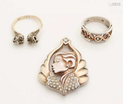 Three silver jewelry, 925/000, consisting of a pendant with a female head and zirconia, 's, 34x48mm,