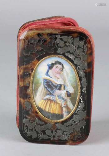 19th Century boulle tortoiseshell pouch with lady's portrait on ivory. Floral deposit partly misses.