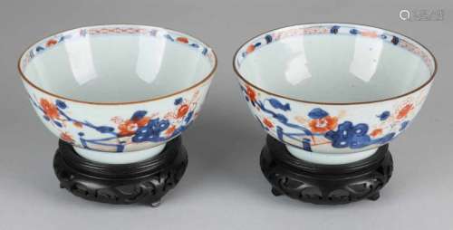 Two 18th century Chinese Imari porcelain bowls with floral decors. One chip and another one