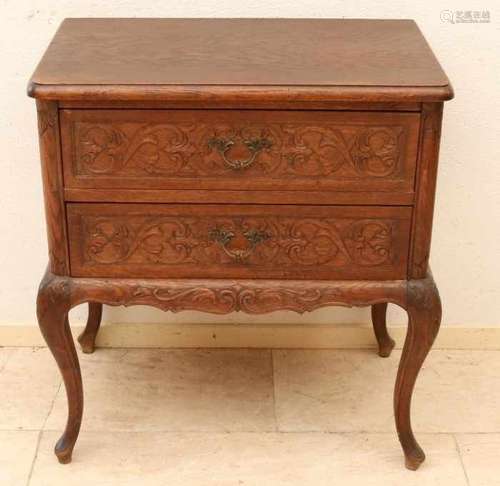 German oak chest of drawers with carving and two drawers. With Queen Ann legs. Mid 20th century.