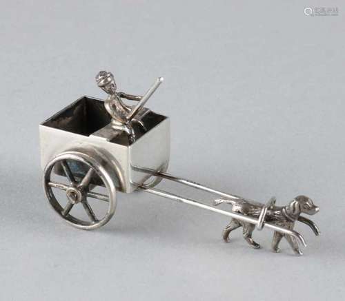 Silver 835/000 miniature of a draft dog for a dog cart with rotating wheels and sitting man with