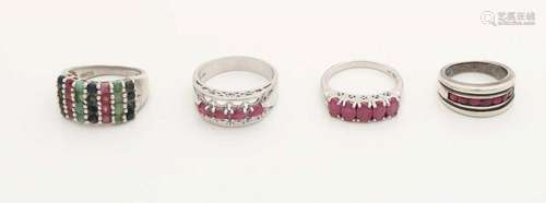 Four silver rings, 925/000, a wide ring with rows of ruby, emerald and sapphire, ø 63, a wide ring