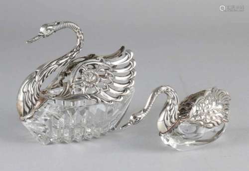 Two swans with crystal and silver, 835/000, a crystal sugar bowl and spice tray with a silver swan