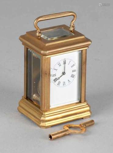 Small old mini travel alarm clock with brass case and enamel dial. Size: 8 cm. In good condition.