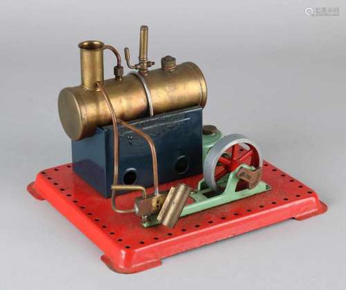 Old tin steam engine with copper kettle. Possibly Meccano. 20th century. Size: 14 x 20 x 18 cm. In