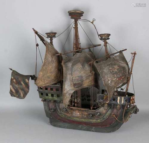 Antique wooden galleon with guns and leather sails. Circa 1900. Size: 58 x 60 x 20 cm. In reasonable