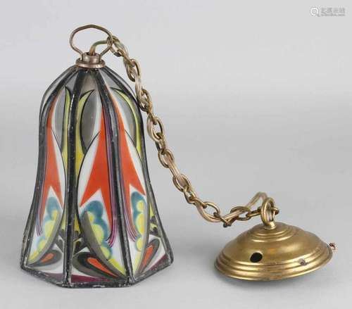 Amsterdam School-style hanging lamp. Stained glass. Circa 1920. One bursts in one window. Size: 23 x