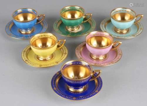 Six Dresden Ambrosius Lamm porcelain chocolate cups in various colors with gold decor. Saxony