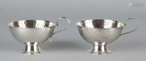 Silver 835/000 hammered bowls on foot, with ear handles. Swedish. MT .: ABC 1965-1966. Size: 4 x 6.5