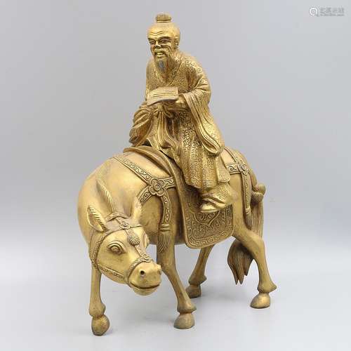 CHINESE GILT BRONZE FIGURE RIDING DONKEY