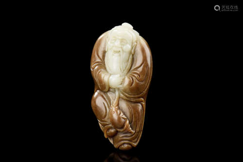 JADE CLEVERLY CARVED 'FISHERMAN' FIGURE