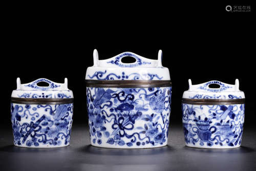 THREE BLUE AND WHITE JARS WITH COVERS