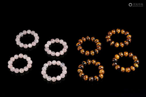 FOUR TIGERSEYE BEAD BRACELETS AND FOUR ROSE QUARTZ BRACELETS