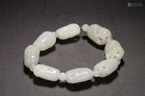 HETIAN JADE CARVED BEAD BRACELET