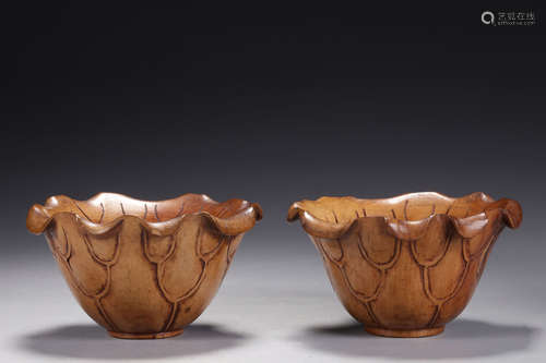 PAIR OF HUANGYANGMU WOOD CARVED FLORIFORM CUPS