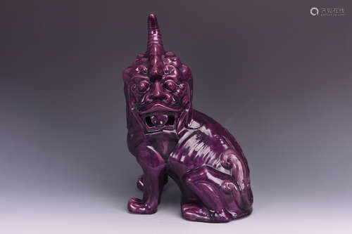 PURPLE GLAZED 'MYTHICAL BEAST' PORCELAIN FIGURE