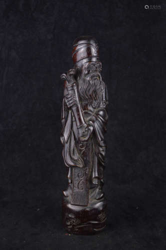 A TAOIST ZHANG IMMORTAL SHAPED WOOD CARVING