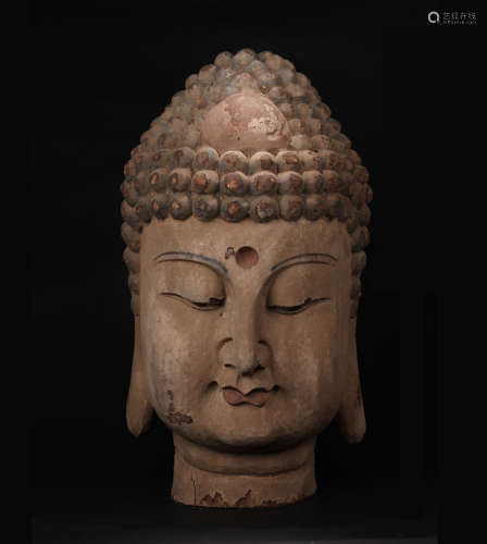A WOOD CARVED SAKYAMUNI BUDDHA HEAD STATUE