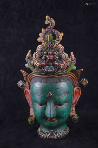A GEM STONES DECORATED BUDDHA HEAD STATUE