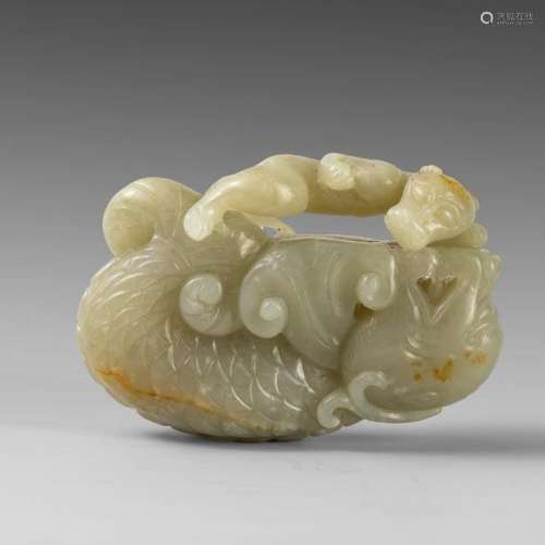 Jade sculpté représentant un dragon et un qilin. L...