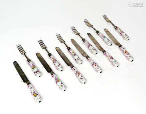 Six Continental porcelain handled knives and six forks 19th century, the moulded handles painted