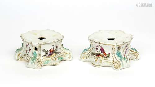 A large pair of Derby stands c.1760, of shaped square form, each painted with panels of exotic birds