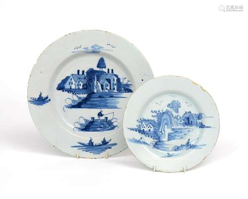A Bristol delftware charger and a plate c.1760, painted in blue with variations of figures fishing