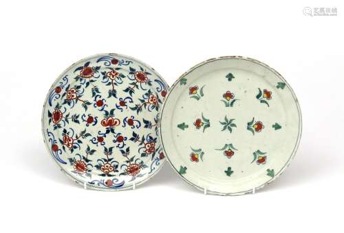 Two London delftware plates c.1710-20, painted in a simple polychrome palette with small stylized