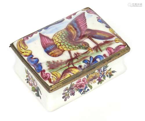 An English enamel snuff box c.1775, the embossed cover decorated with a large bird with outstretched