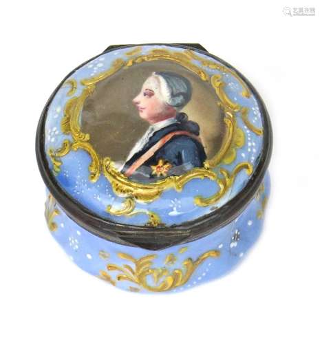 An English enamel patch box c.1760-70, painted with a profile portrait of George III, within a