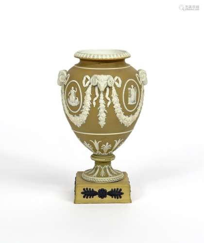 A Wedgwood Jasperware pot pourri vase 20th century, applied in white on a brownish yellow ground