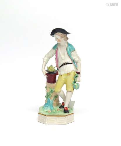 A Derby figure of Earth c.1780, modelled by Pierre Stephan as a young gardener standing beside a