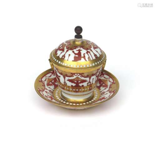A Paris porcelain bowl with cover and stand 19th century, painted in red and gilt with seated