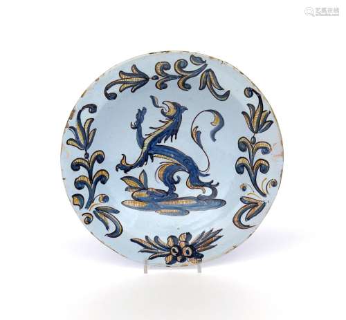 A Talavera or Puente del Arzobispo faïence dish c.1675, from the Three Colour Family, boldly painted