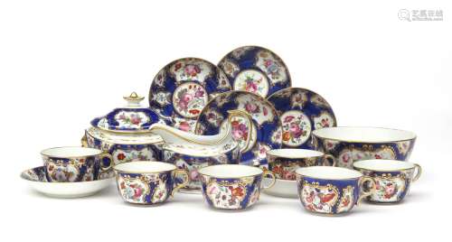 A Coalport part tea service early 19th century, painted with sprays of flowers within gilt