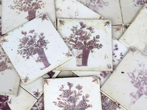 Thirty nine Chinese porcelain tiles mid 18th century, decorated after London delftware with