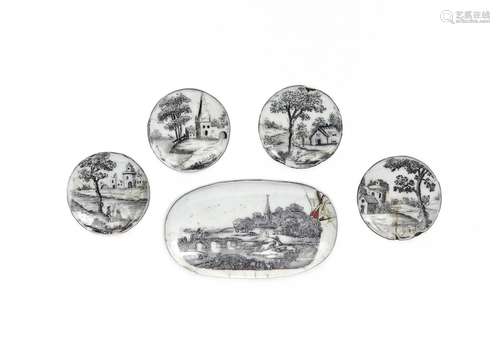 Four English enamel circular plaques c.1760-70, printed in black with landscape scenes of European