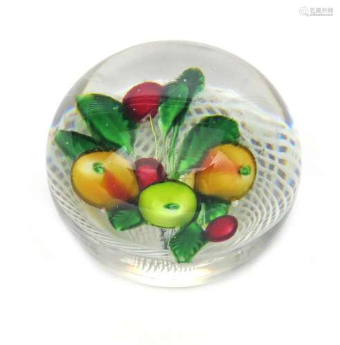 A St Louis fruit paperweight c.1850, set with a pear, two apples and three cherries on leafy