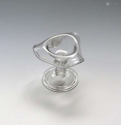 An unusual small sweetmeat glass c.1720, the bowl modelled as an upturned tricorn hat with a