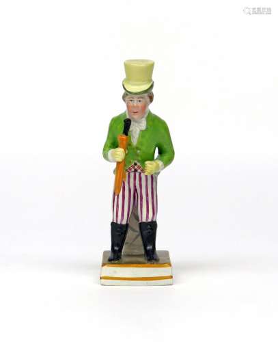 A pearlware theatrical figure of John Liston c.1810, in his role as Paul Pry, holding his umbrella