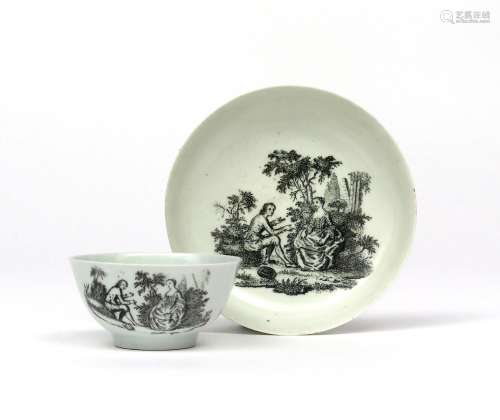 A Philip Christian (Liverpool) teabowl and saucer c.1765, printed in black with the Rock Garden, a