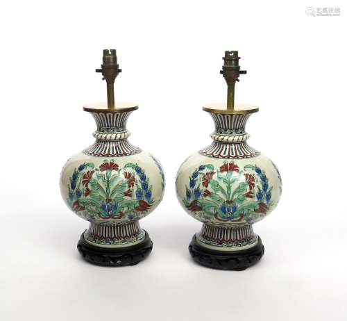 A pair of Samson Iznik-style vases late 19th century, the flattened globular forms painted in
