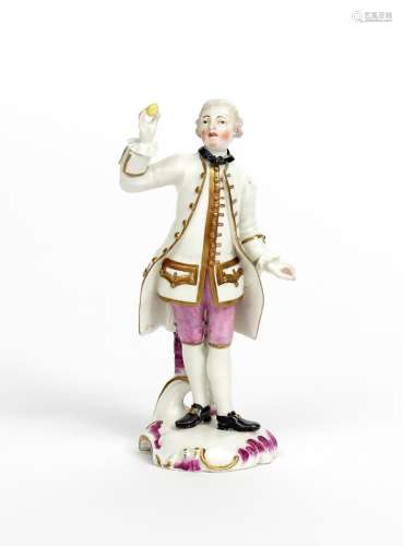 A Frankenthal figure of a gallant c.1765, standing and holding a single lemon aloft in his right