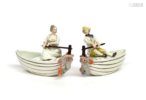 A pair of Frankenthal sweetmeat figures c.1760-65, each modelled as a small boat with a figure