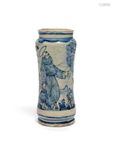 A rare signed Italian maiolica albarello c.1700, the slender waisted form painted in blue with St